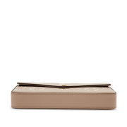 Louis Vuitton
Tourterelle and Crème Monogram Empreinte Pochette Félicie Gold Hardware, 2021